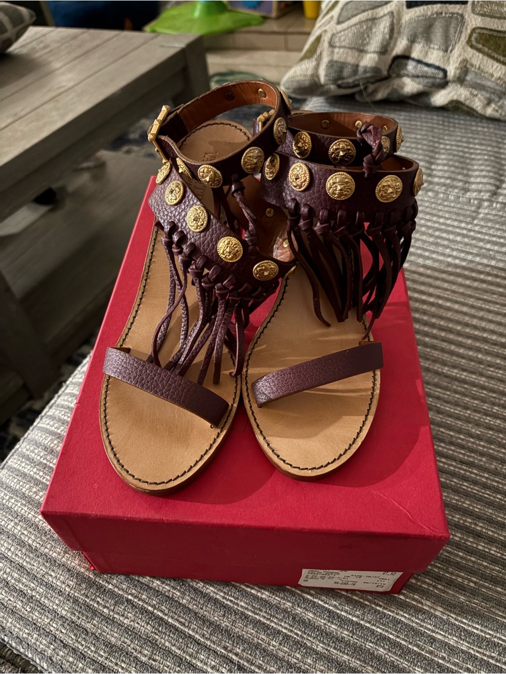 Valentino Garavani Burgundy Fringe Gladiator Sandals with Gold Medallions